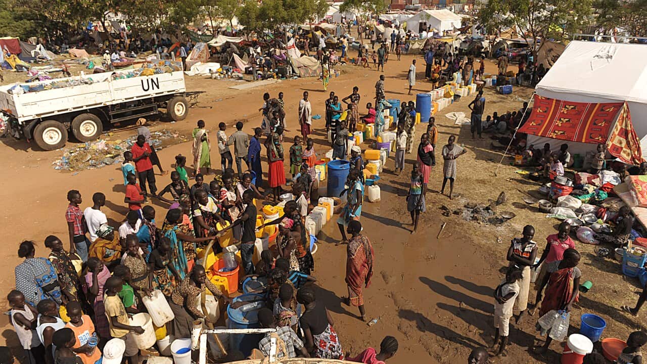 Displaced people queue for water at the UN compound in Juba - Getty-1.jpg