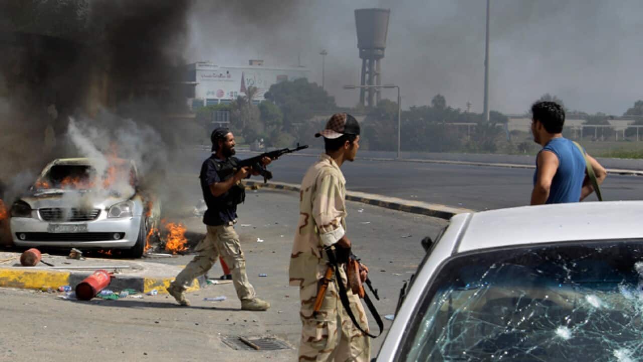 Tripoli_rebels_guns_110823_B_AAP_178460802