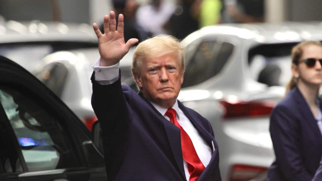 Donald Trump leaves Trump Tower