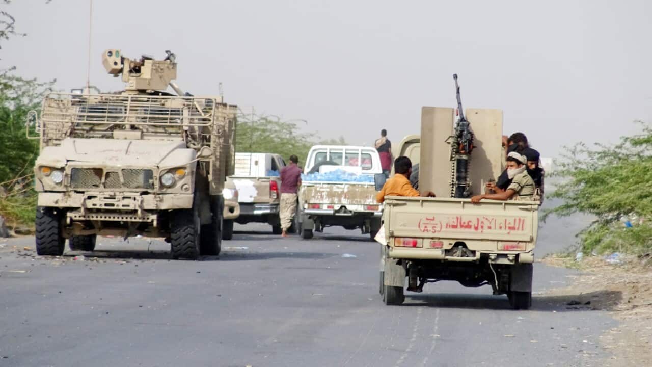 Yemeni government forces take part in battles at the port city of Hodeidah, Yemen.