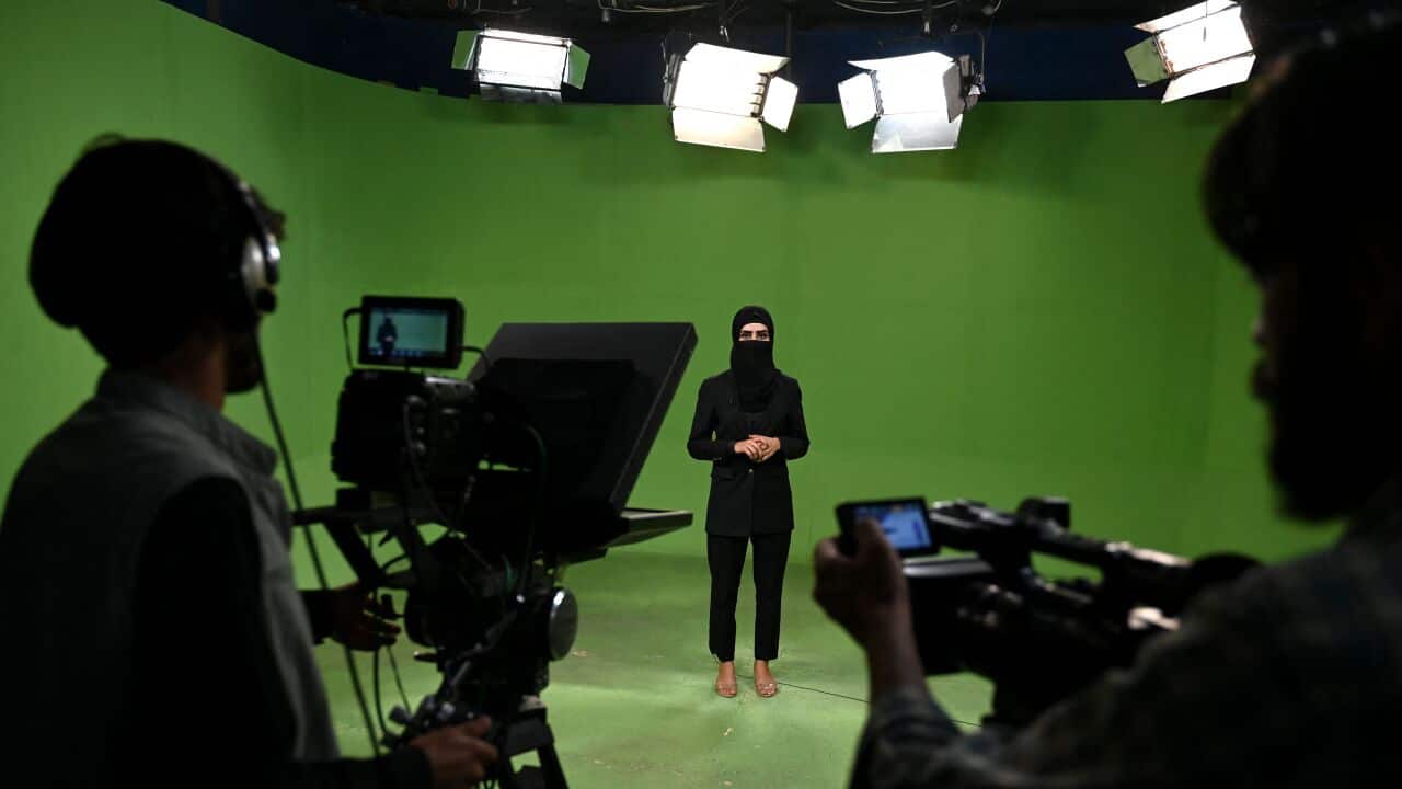 TOPSHOT-AFGHANISTAN-WOMEN-RIGHTS-TALIBAN-MEDIA