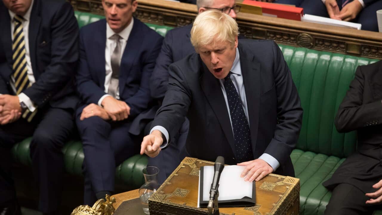 A handout photo made available by the UK Parliament shows British Prime Minister Boris Johnson gesturing JESSICA TAYLOR HANDOUT EDITORIAL USE ONLY/NO SALES