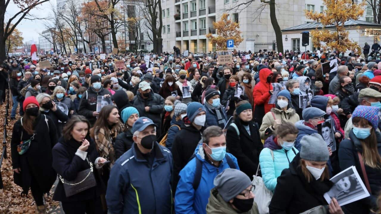 People take part in a protest under the slogan 'Not one more' in Warsaw, Poland, 6 November 2021.