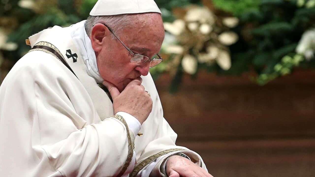 Pope Francis leads the Midnight Mass in Saint Peters Basilica