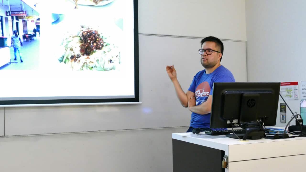 Osmond Chiu in a lecture theatre