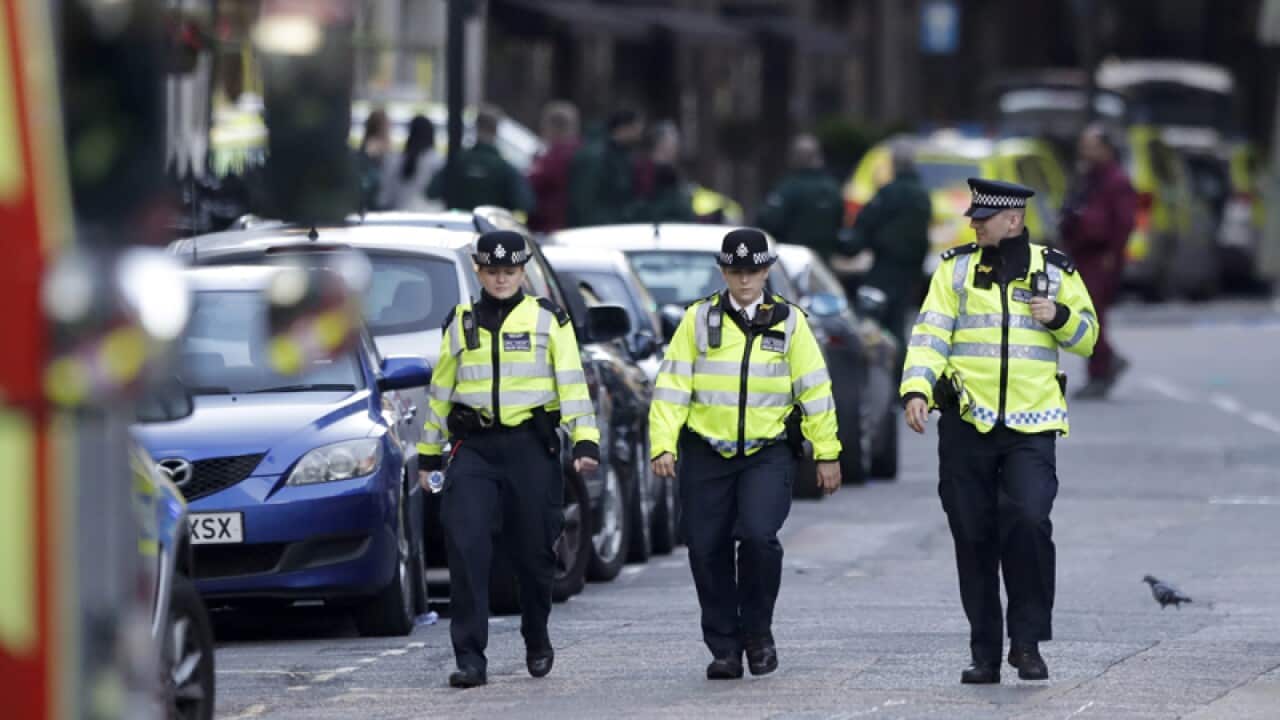 Police officers following an attack in London