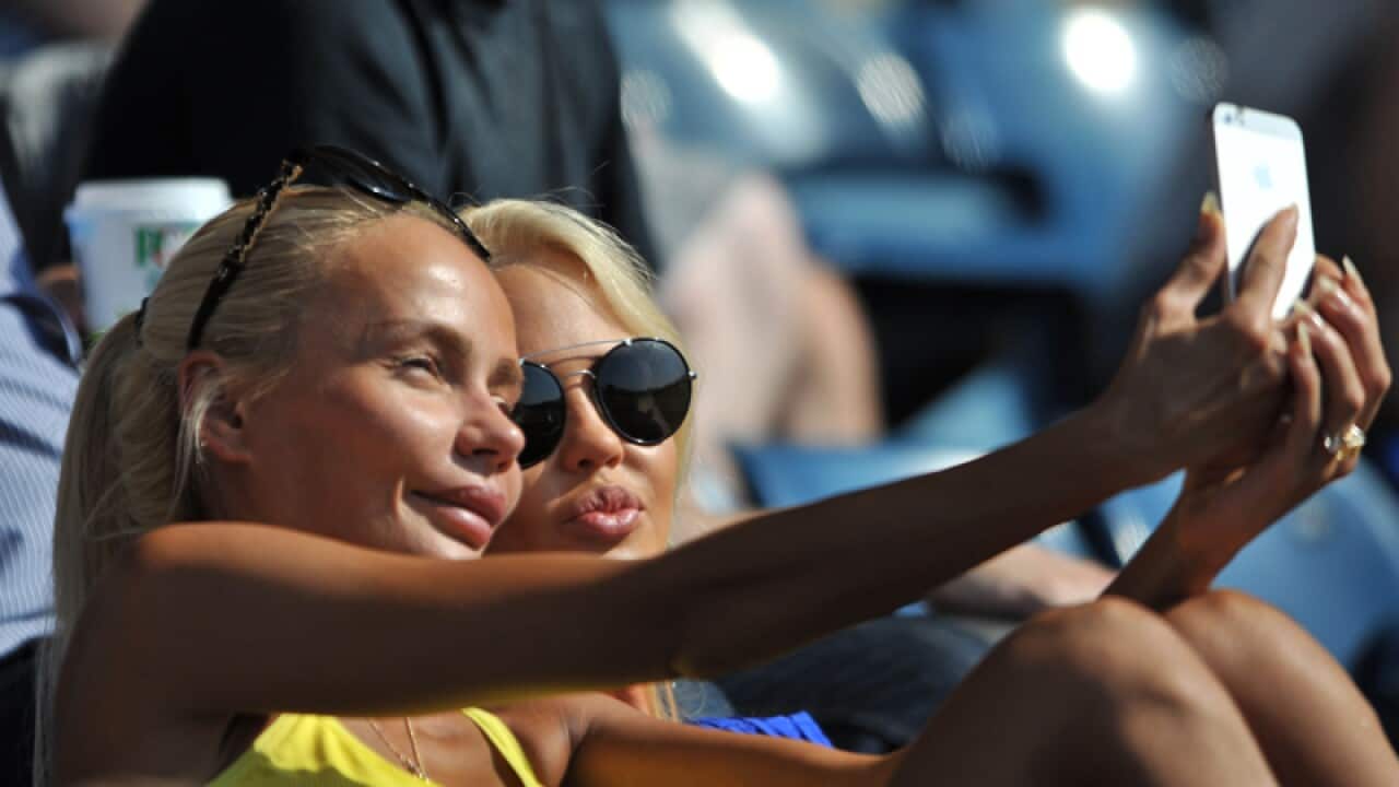 People taking a selfie