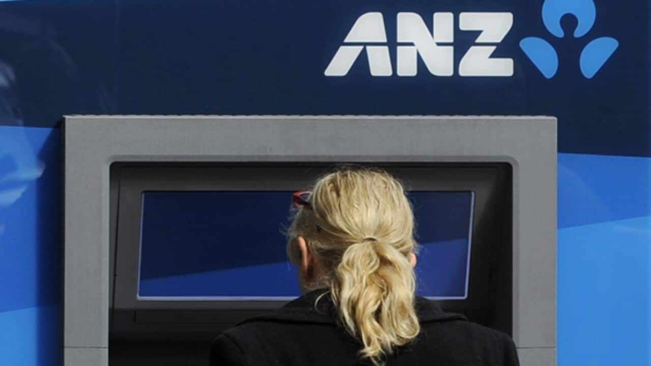 File photo of a customer using an ANZ ATM