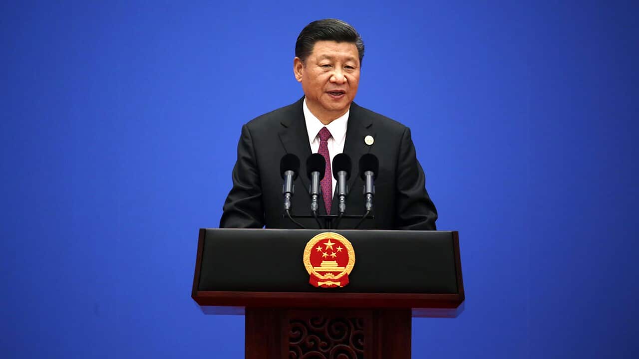 Xi