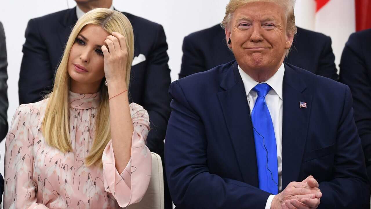 US President Donald Trump seated with his daughter Ivanka.