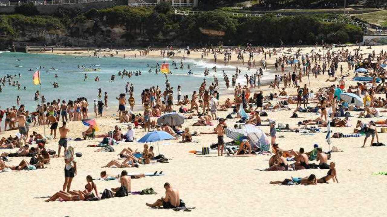 Beachgoers cool off from the heat at Bondi Beach in Sydney.