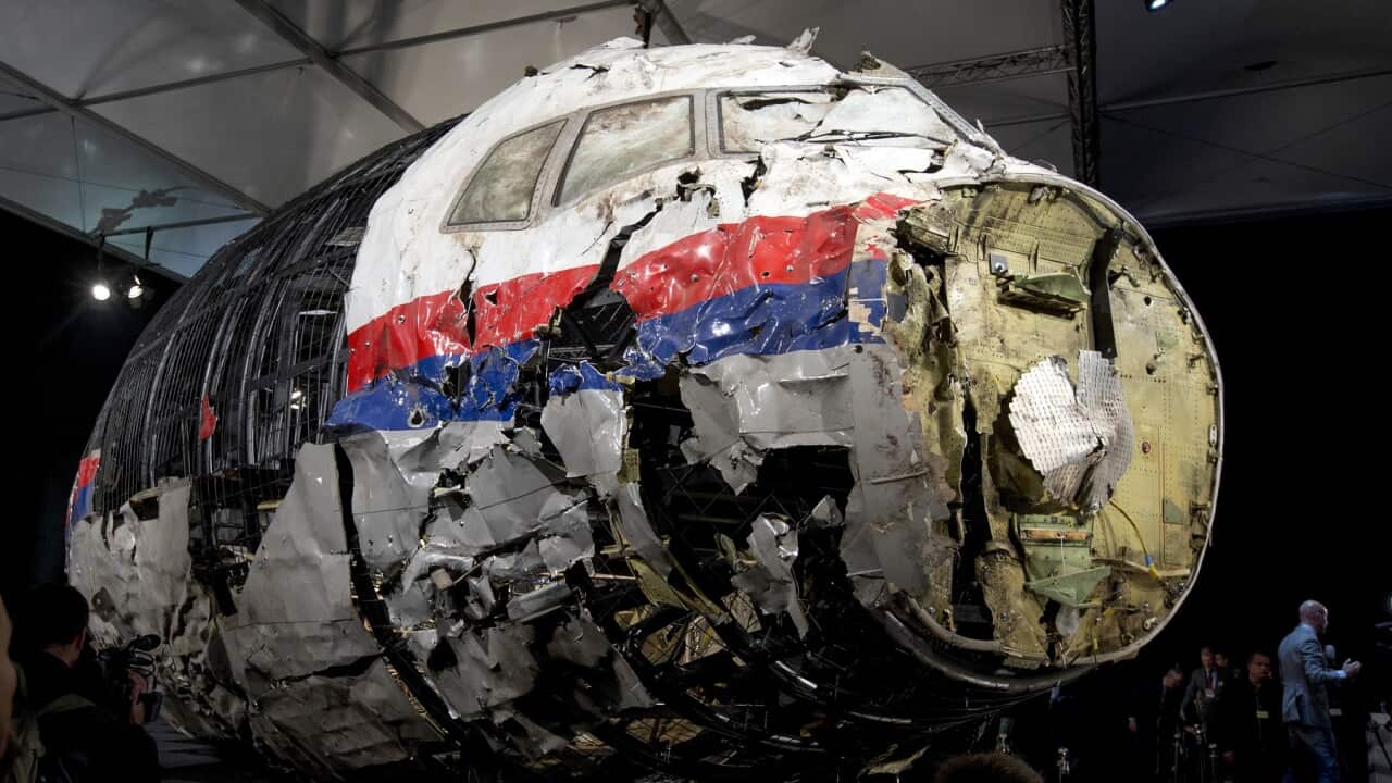 The reconstructed wreckage of MH-17