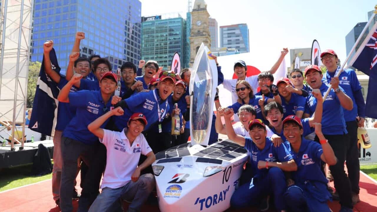 Tokai Challenger and the team after the finish of the World Solar Challenge in Victoria Square, Adelaide. Thursday 17 Oct 2019 (Photo by Tokai University Solar CarTeam)