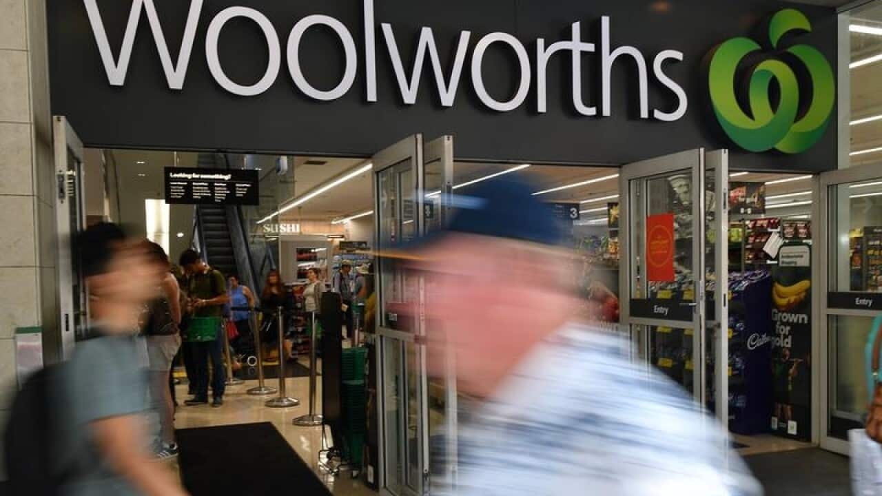 Woolworths signage outside a store.