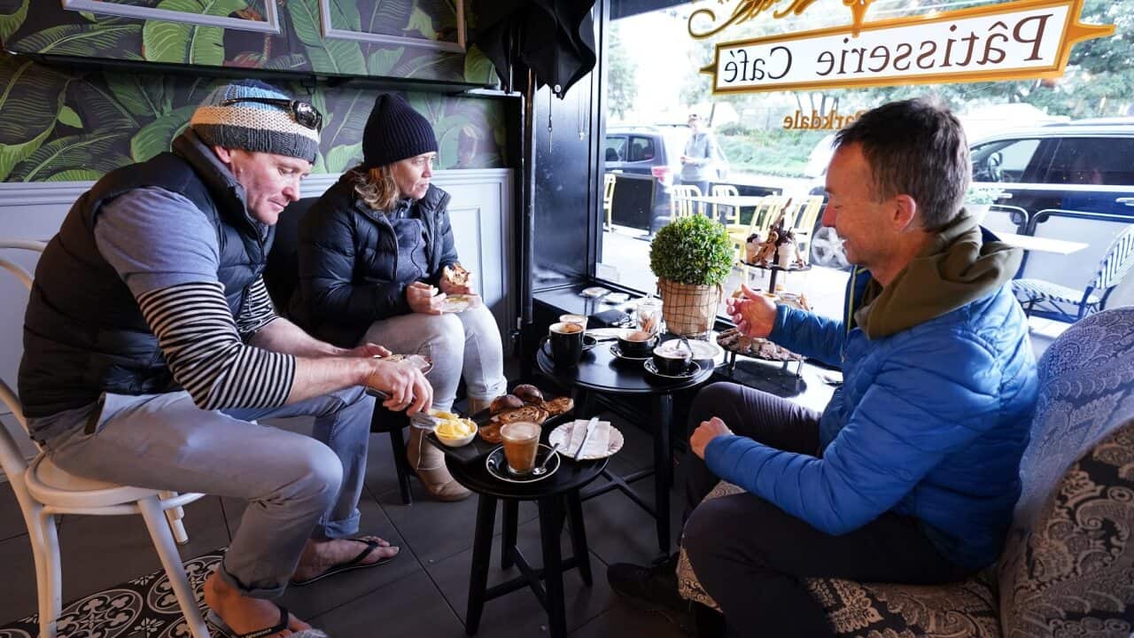Patrons are seen having coffee at Flavours Patisserie Cafe in Parkdale, Victoria.