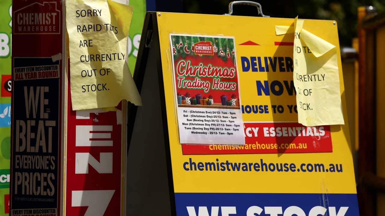 Signs indicating that this chemist is out of Covid-19 rapid antigen tests.