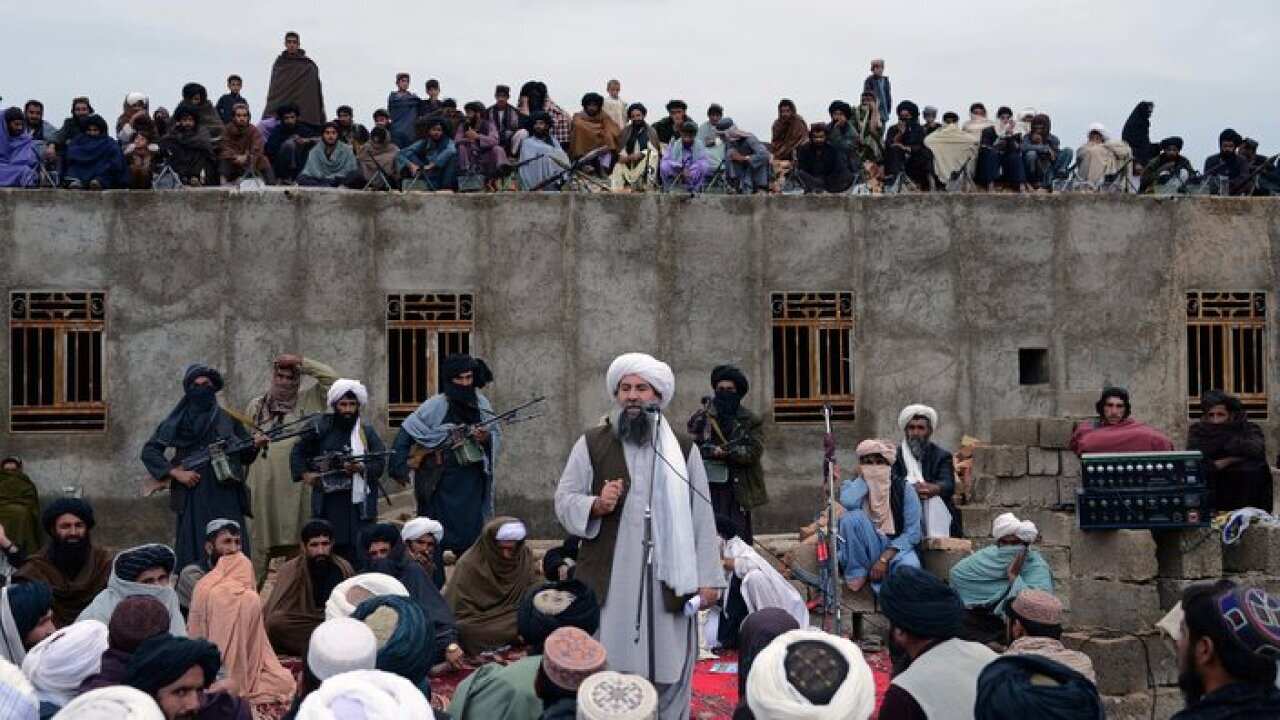 Mullah Abdul Manan Neyazi (C), a deputy of Mullah Mohammad Rasool Akhund, the newly appointed leader of a breakaway faction of the Taliban.