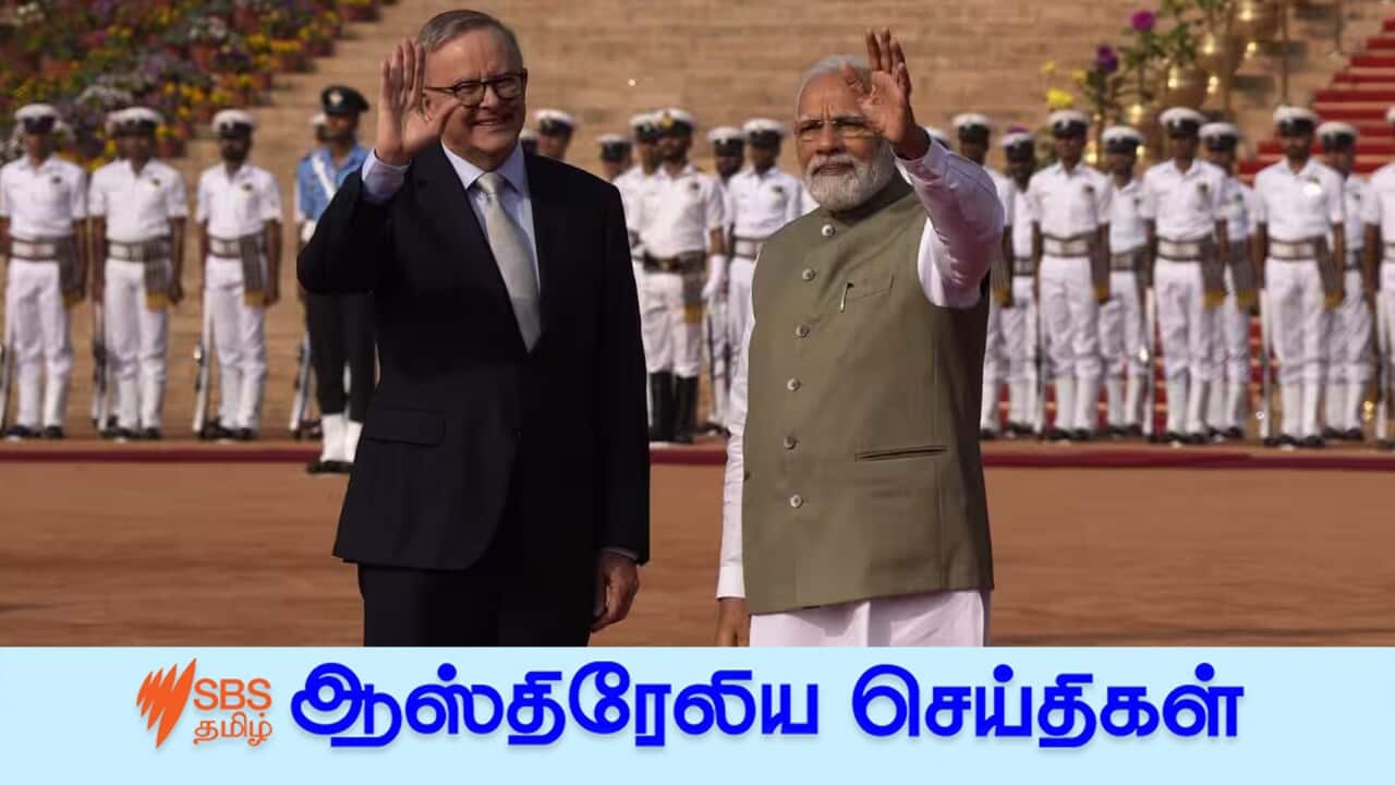 Indian Prime Minister Narendra Modi his Australian counterpart Anthony Albanese wave to media during laters's ceremonial reception at the Indian presidential palace, in New Delhi, India, Friday, March 10, 2023. Australia is striving to strengthen security cooperation with India and also deepen economic and cultural ties, Prime Minister Anthony Albanese said on Friday. (AP Photo/Manish Swarup) Source: AAP / Manish Swarup/AP