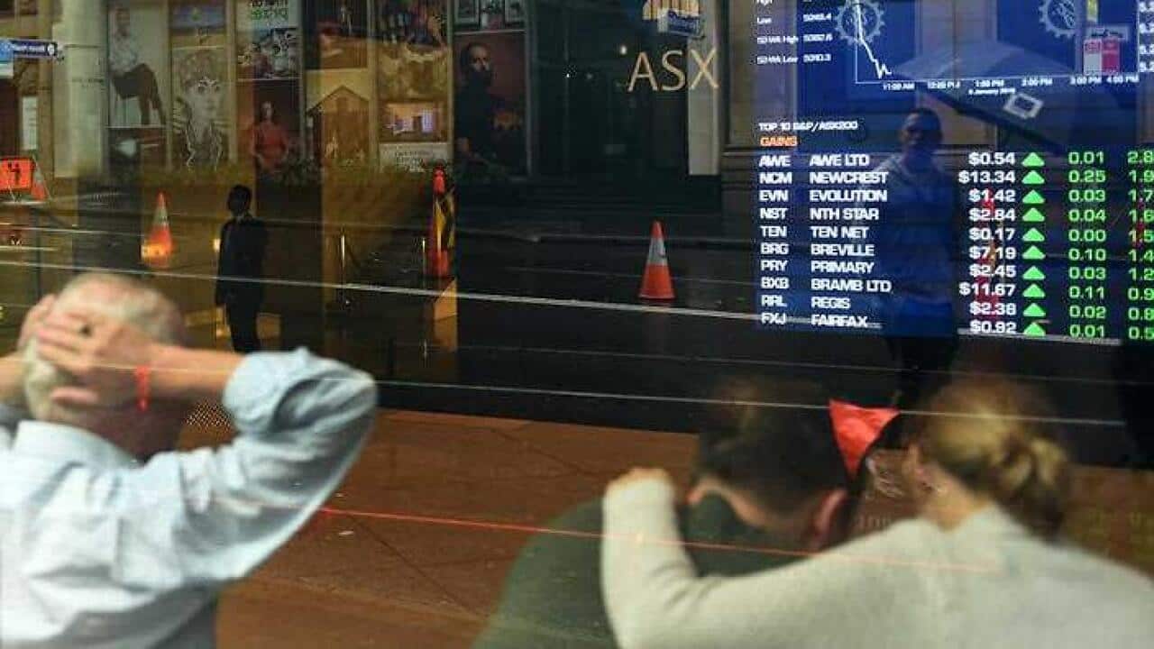 Australian stocks have suffered widespread falls after huge losses on Wall Street overnight. (AAP)