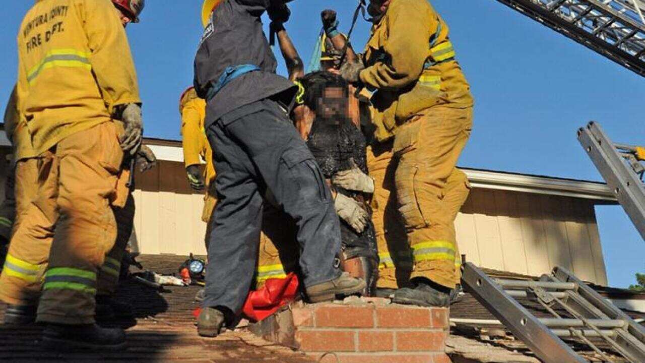 Woman stuck in chimney after breaking into home of man she met online. (Twitter: @VCFD_PIO)
