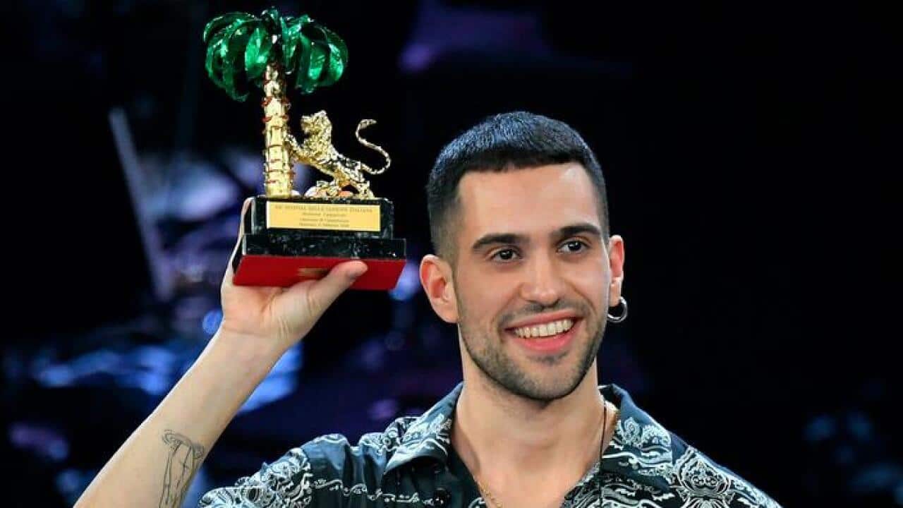 Italian singer Mahmood celebrates on stage after winning the 69th Sanremo Italian Song Festival at the Ariston theater in Sanremo, Italy, on Saturday, Feb. 9, 2019. (Ettore Ferrari/ANSA via AP)