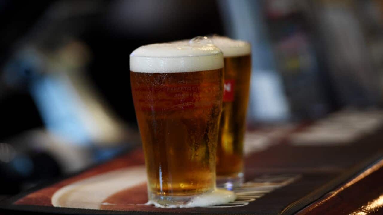 Australians urged to cut back under new alcohol use guidelines