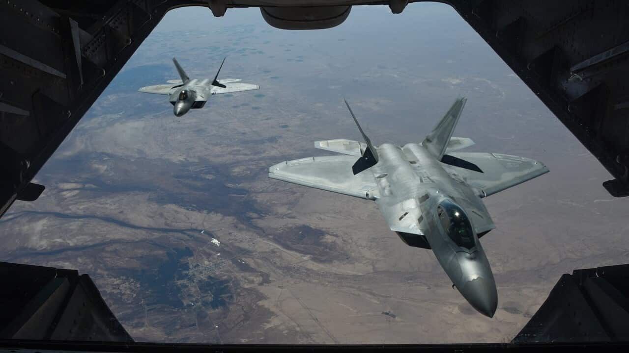 United States F-22 stealth fighter jets above Syria.