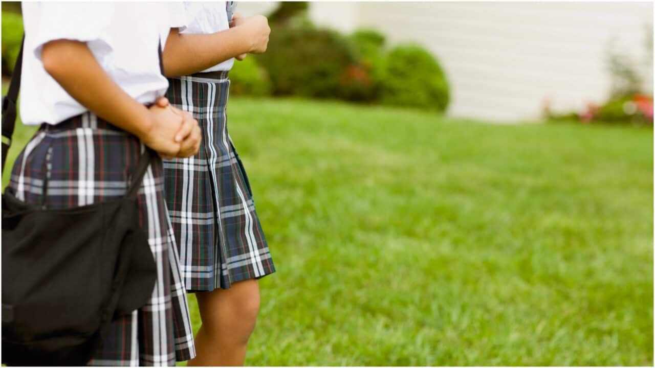 School students in uniform.