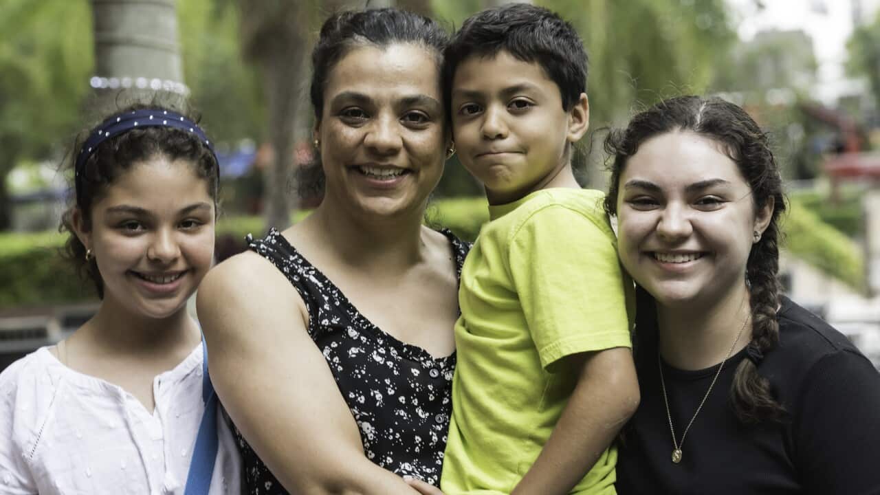 Hispanic woman with her children