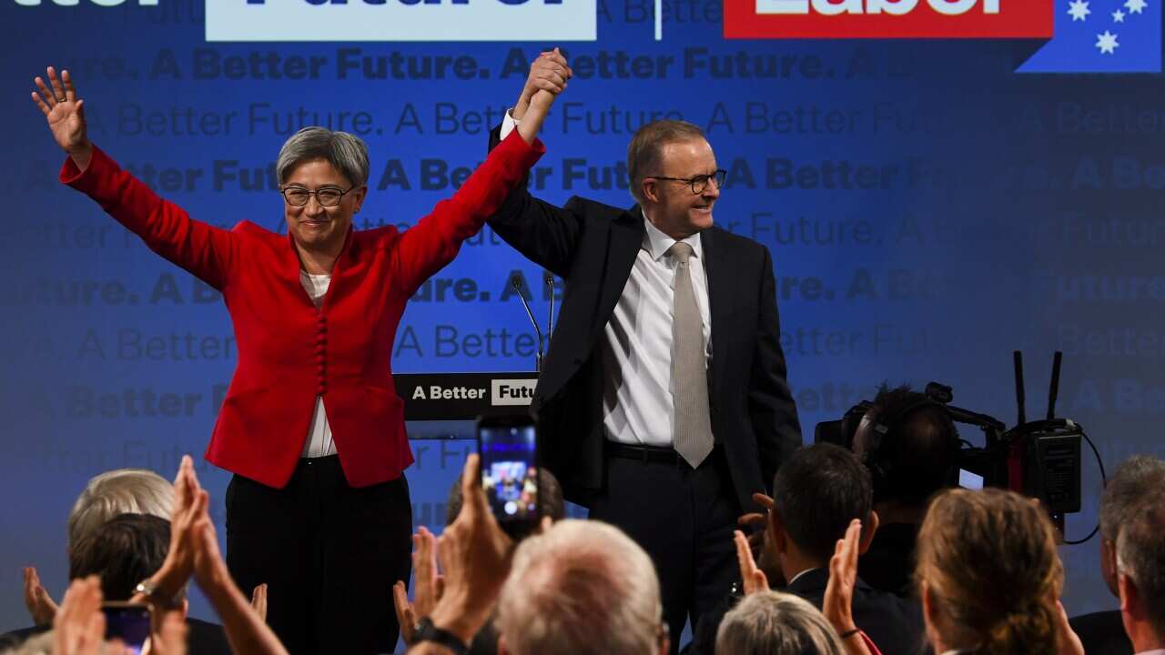 Australian Albanese (right) and shadow Foreign Affairs Minister Penny Wong acknowledge the crowd at the Labor Party campaign launch in Perth.