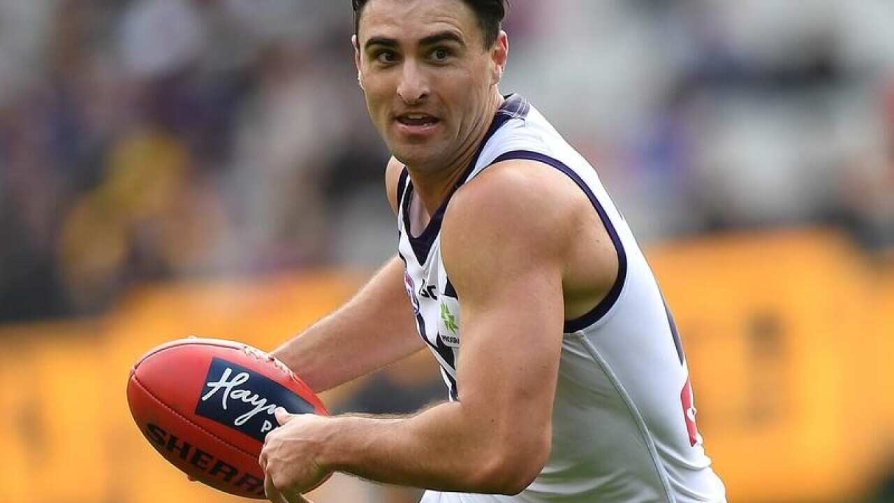 Shane Kersten of the Dockers is seen in action.