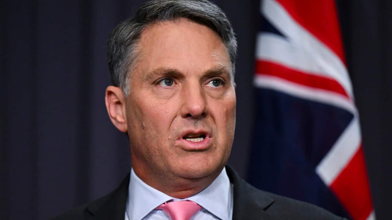 A man wearing a suit