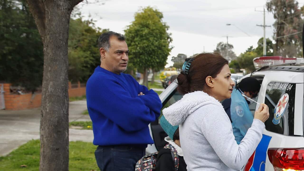 Paramedics perform COVID19 tests in Broadmeadows after Victoria State Government Health and Human Services people knock on doors