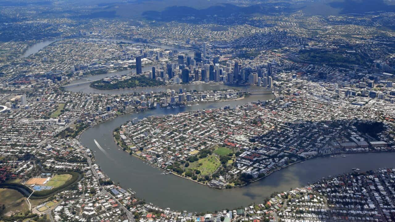 An aerial view of the Brisbane river and city.