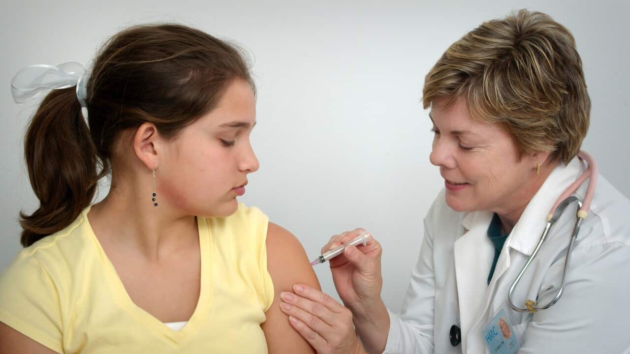 A nurse is vaccinating a young girl - CDC - Unsplash