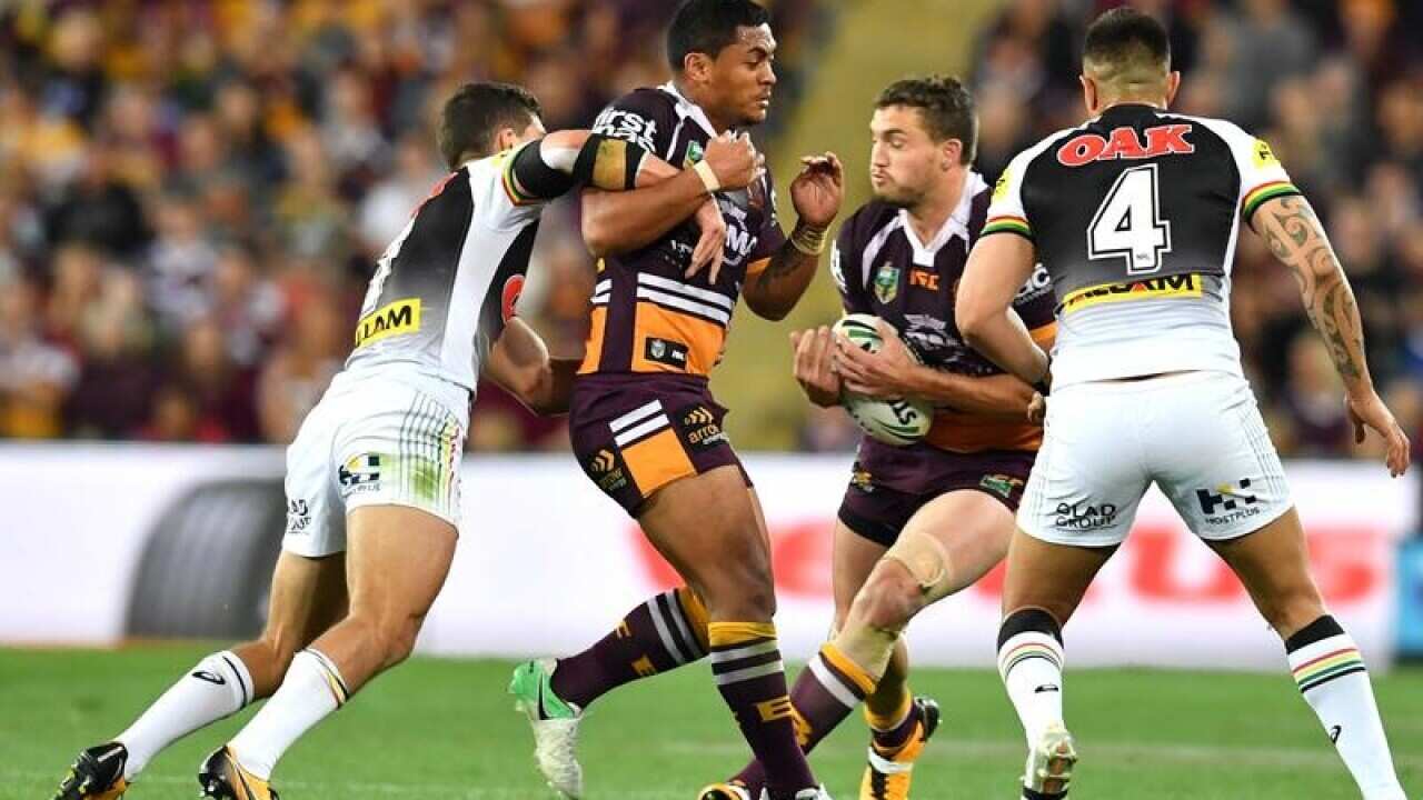 Brisbane's Corey Oates a moment before running into Anthony Milford