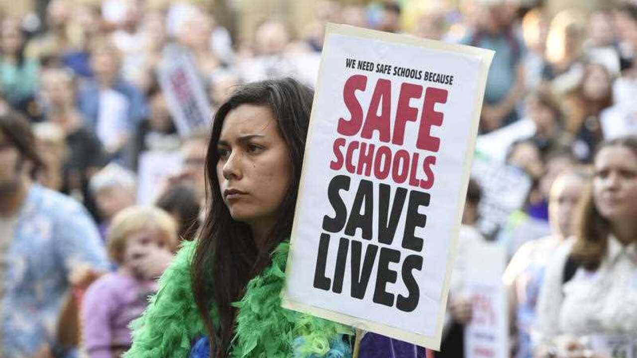 Thousands of Melbournians rallied outside the State Library in Melbourne to support the LGBTI student program.