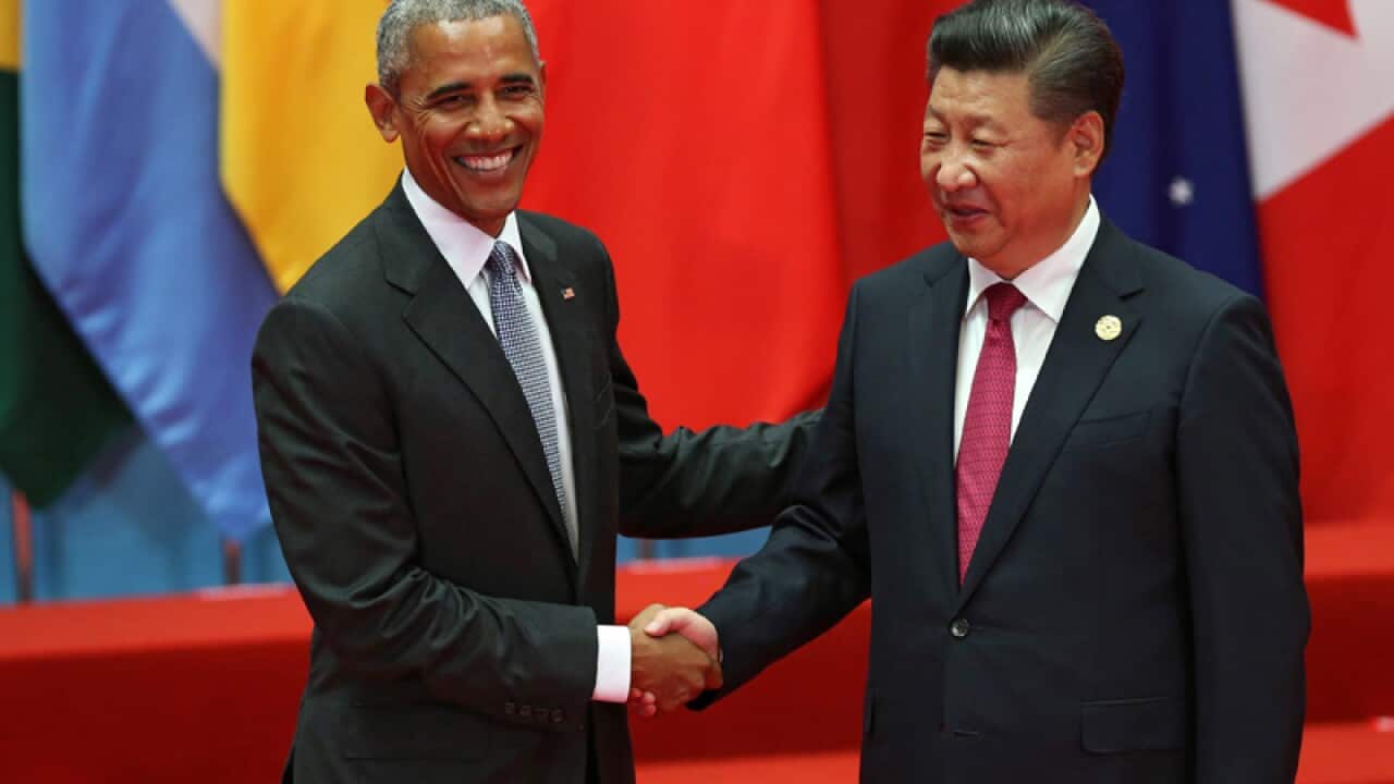 Chinese President Xi Jinping (R) and US President Barack Obama(L)