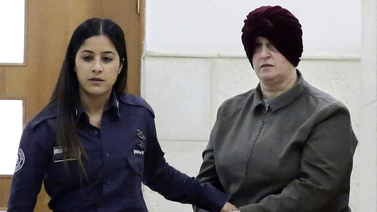 Australian Malka Leifer, right, is brought to a courtroom in Jerusalem. February, 2018.