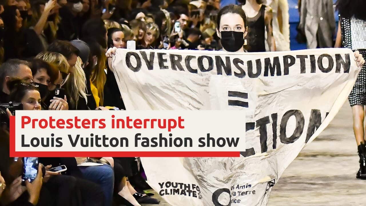 Extinction Rebellion protesters interrupt Louis Vuitton fashion show
