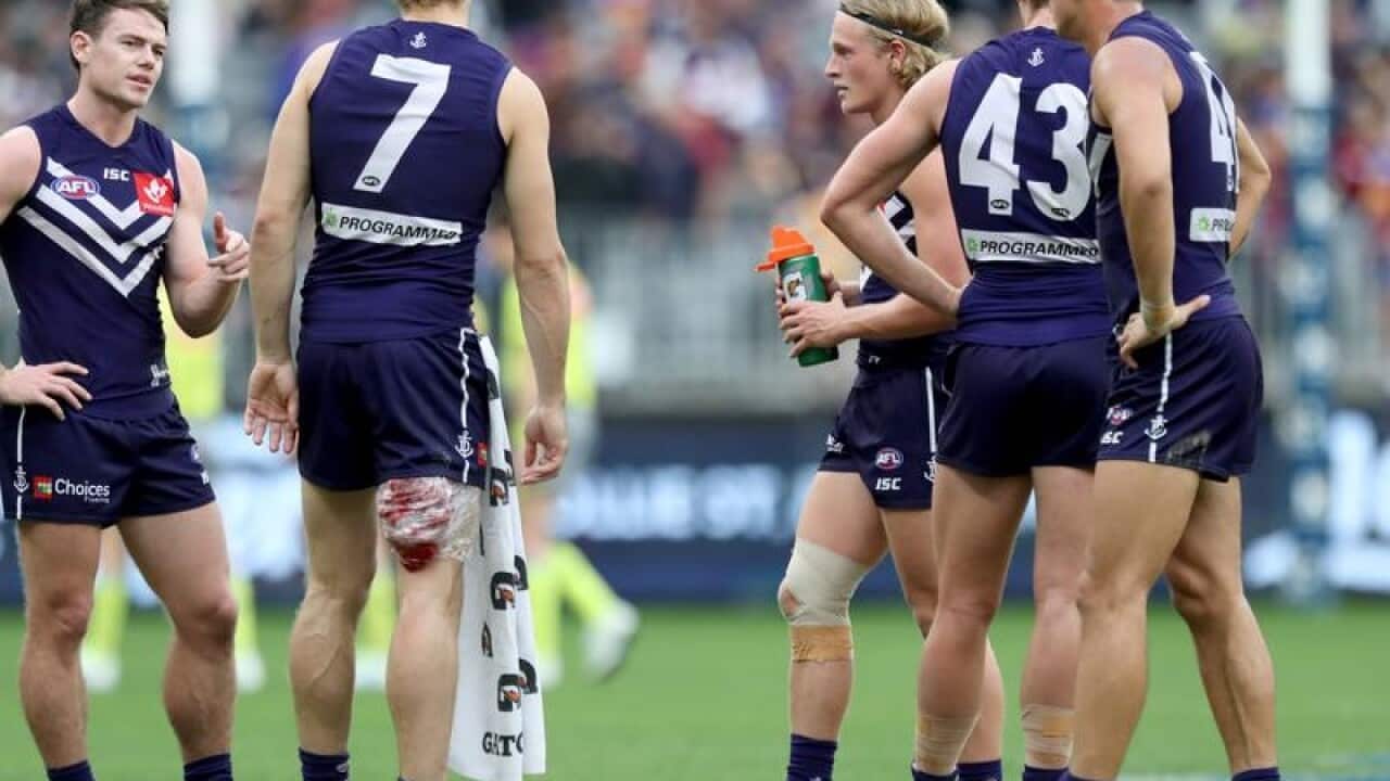 An injured Nat Fyfe of the Dockers