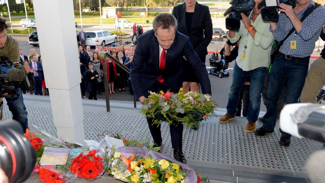 Opposition leader Bill Shorten lays a wreath at the Old Parliament.