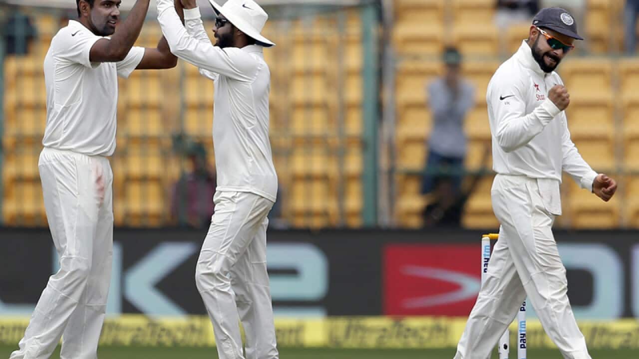 Indian captain Virat Kohli (R)