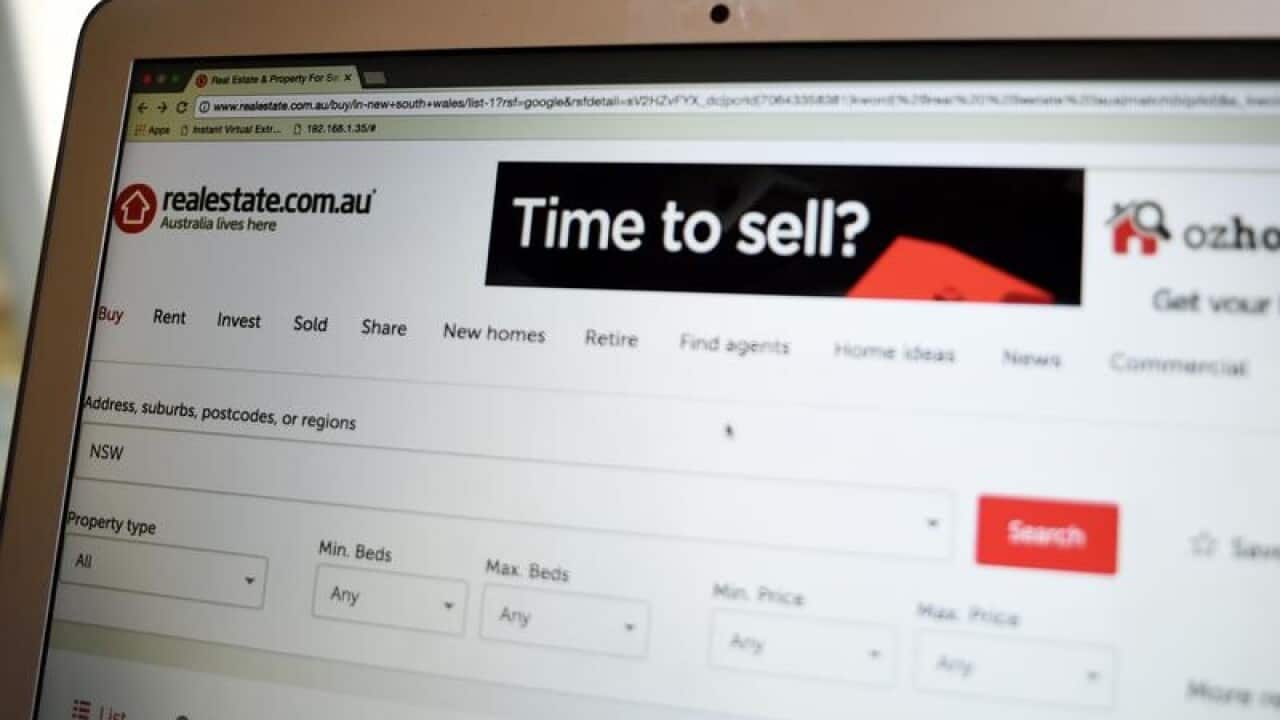 Computer monitor screen showing realestate.com.au website page