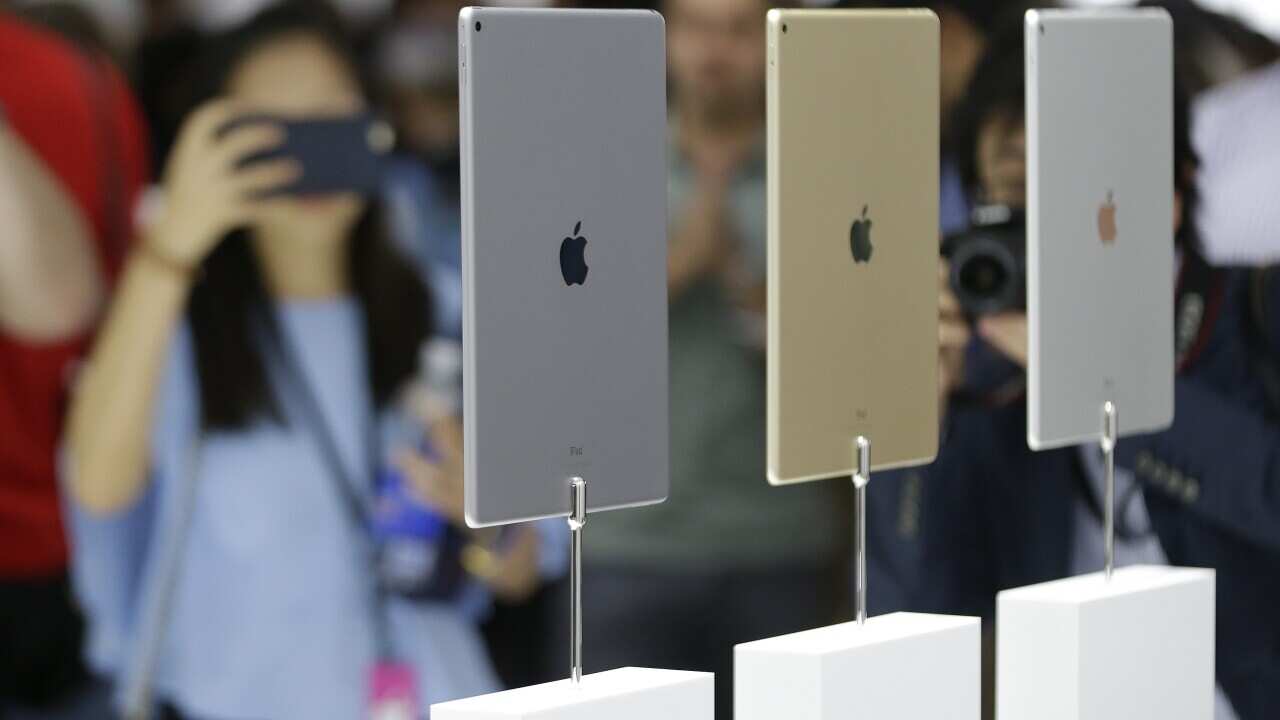 The new Apple iPad Pro is seen in three different finishes during a product display following an Apple event Wednesday, Sept. 9, 2015, in San Francisco. 