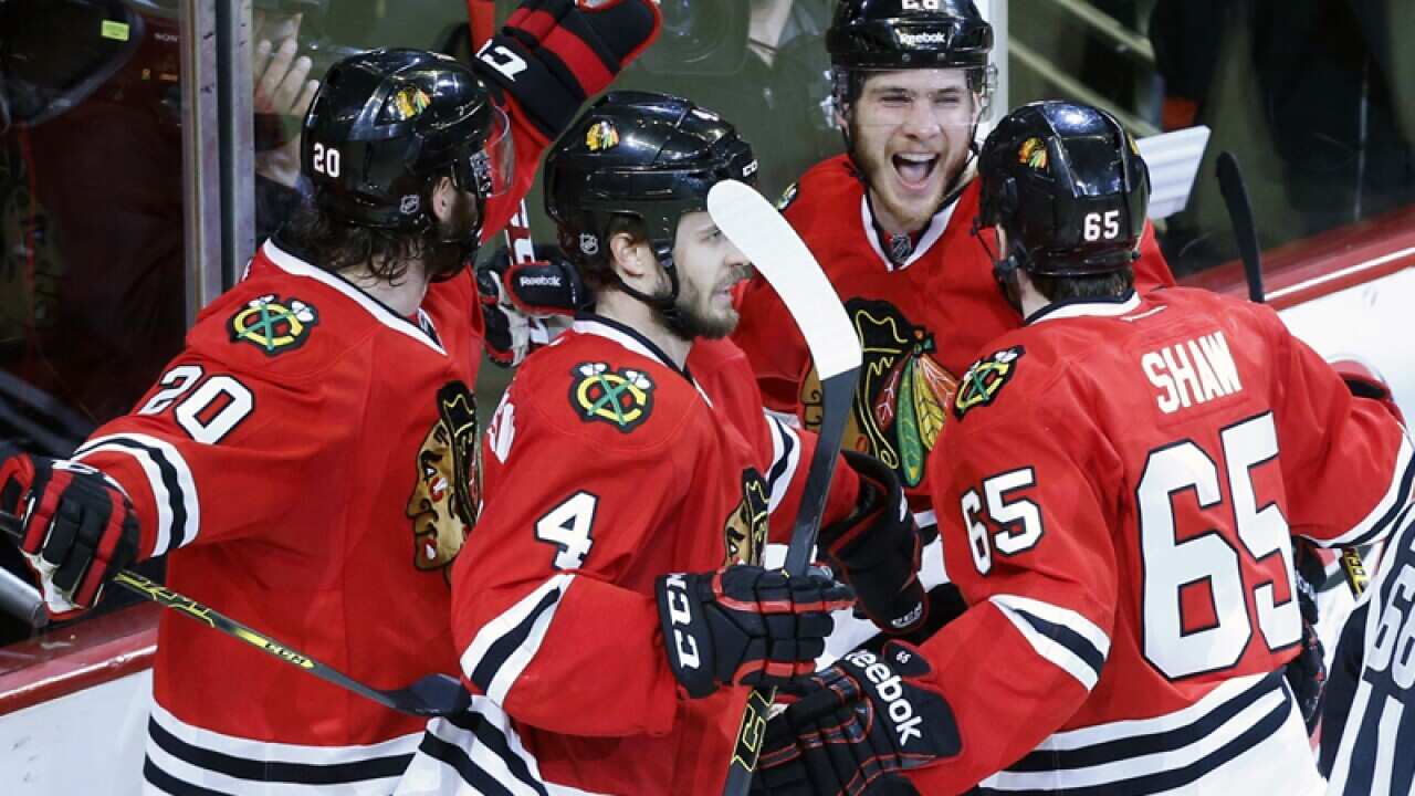 Chicago Blackhawks player Ben Smith celebrates after scoring