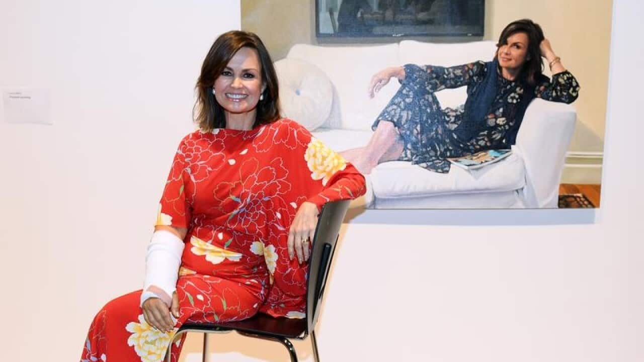 Lisa Wilkinson poses in front of her portrait