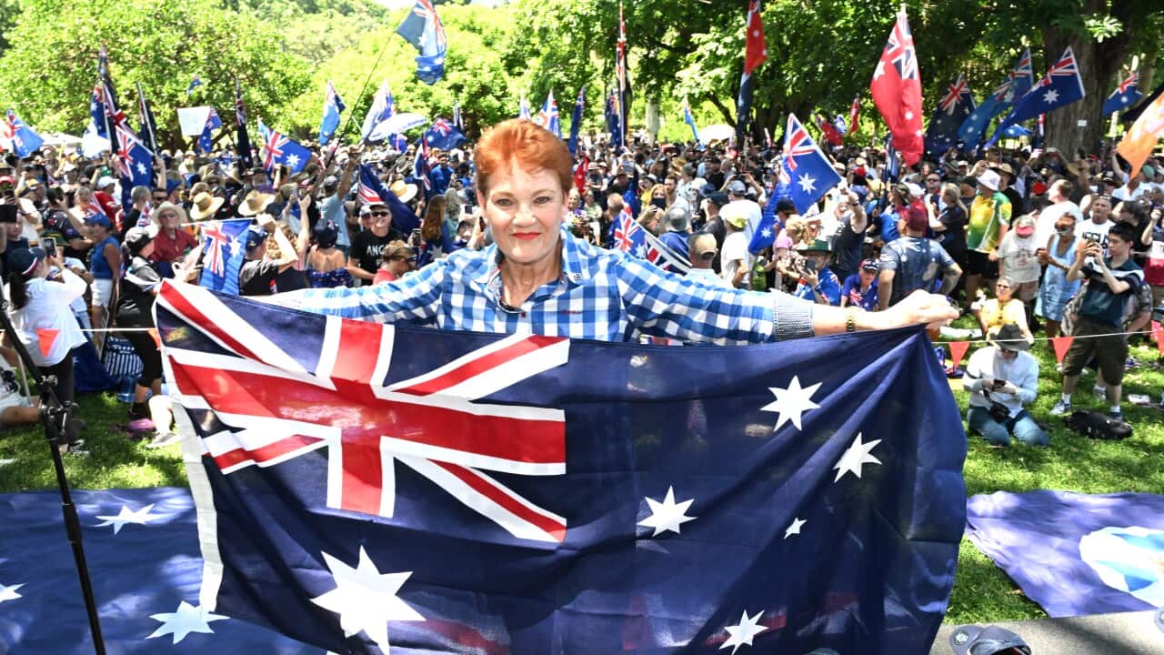 One Nation Leader Pauline Hanson is seen with people attending an Australia Marches rally during Australia Day celebrations in Brisbane, Monday, January 26, 2026