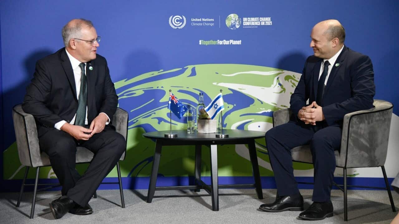 Israeli Prime Minister Naftali Bennett (L) meets Australian Prime Minister Scott Morrison (R)