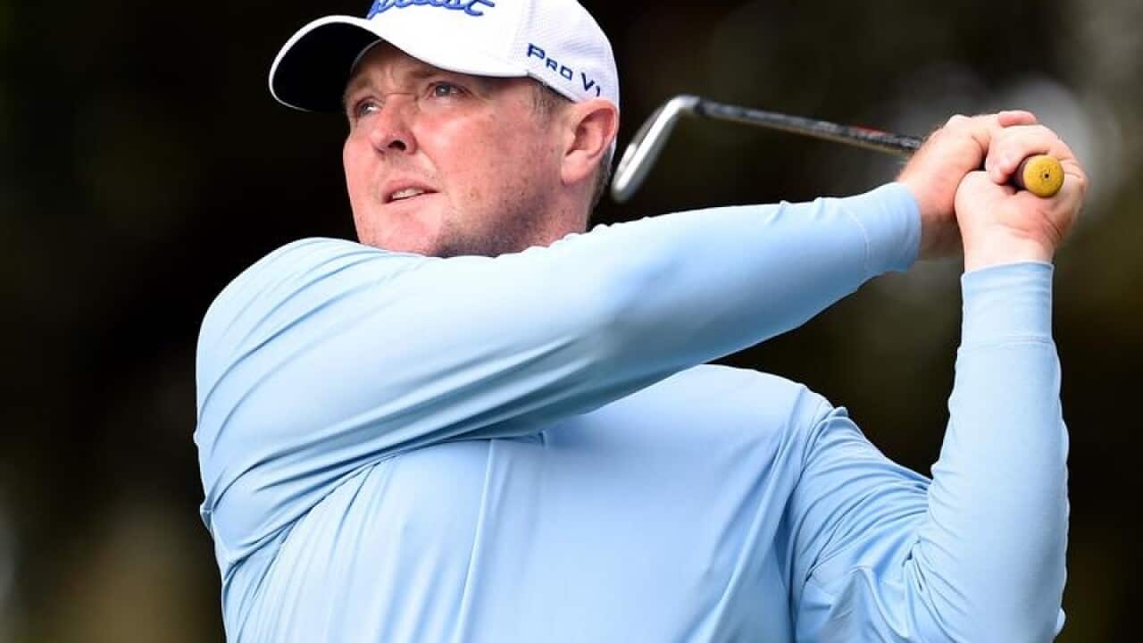 Australian golfer Jarrod Lyle tees off.